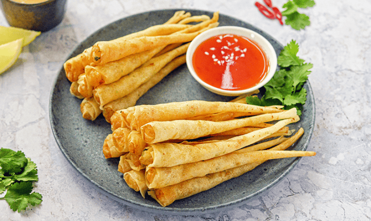 a plate of fried food with sauce