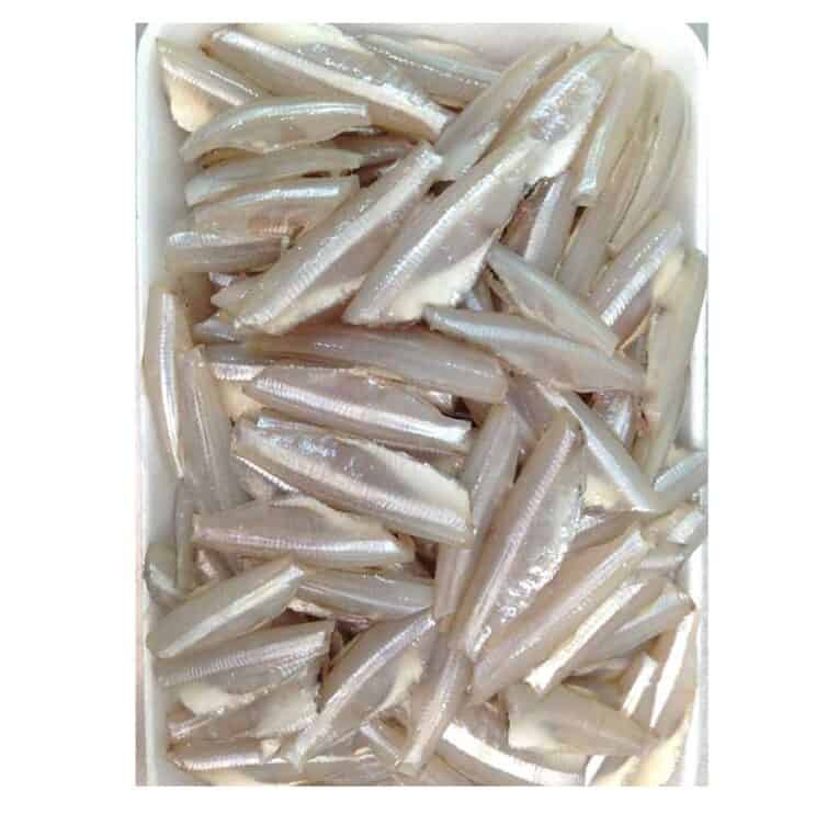 a tray of fish in a pile