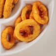 a plate of fried onion rings