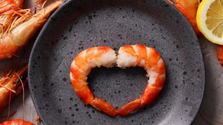 a heart shaped shrimp on a plate