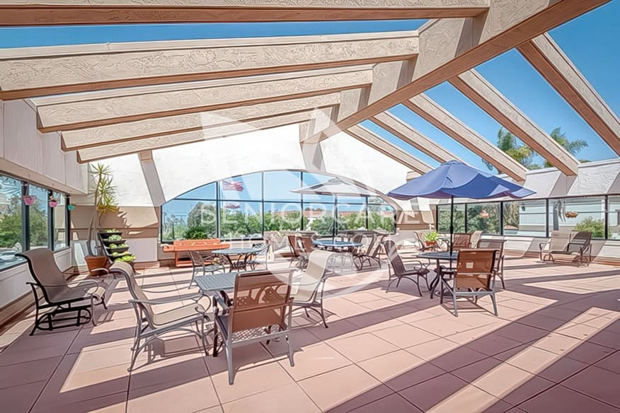Covered, outdoor patio lounge area at Silverado Encinitas
