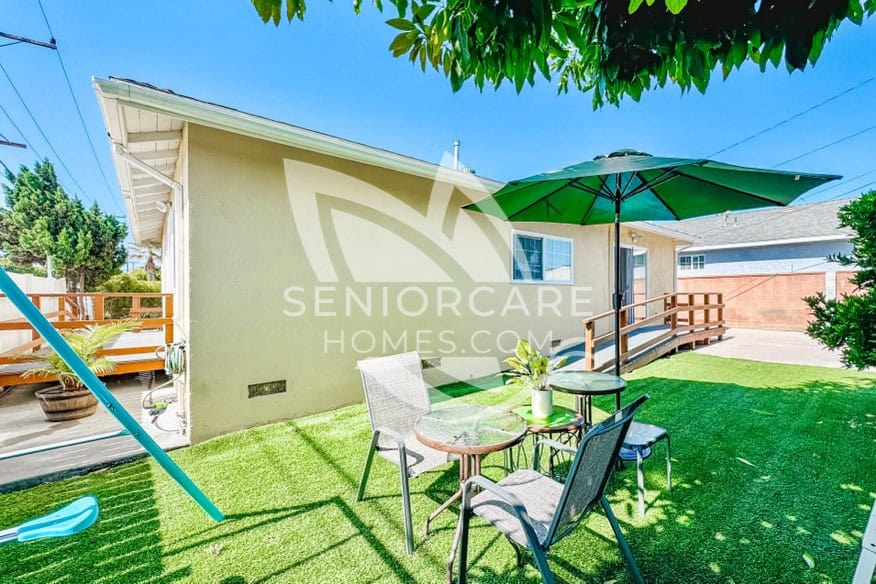 Outdoor patio with umbrella at Sweet Life Guest Home