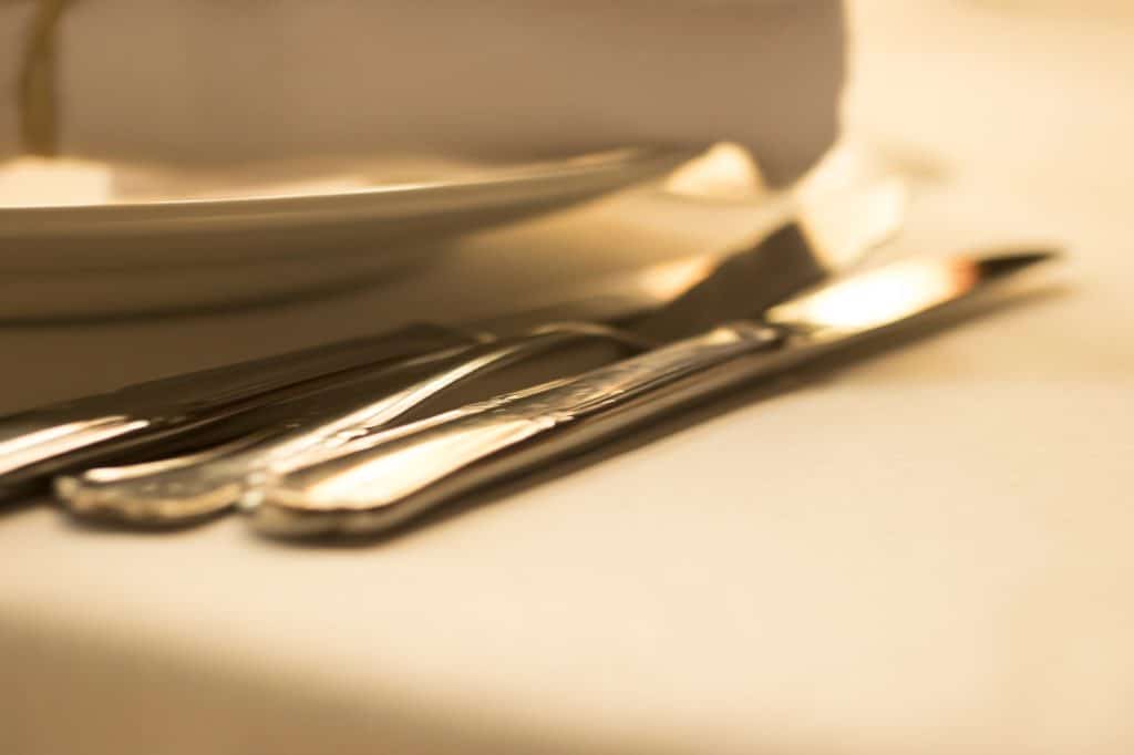 A laid table in a high-end restaurant