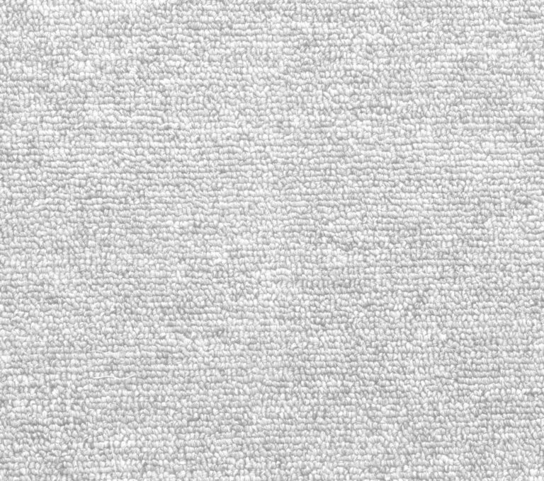 Close-up of a clean, plush commercial carpet in a professional setting.