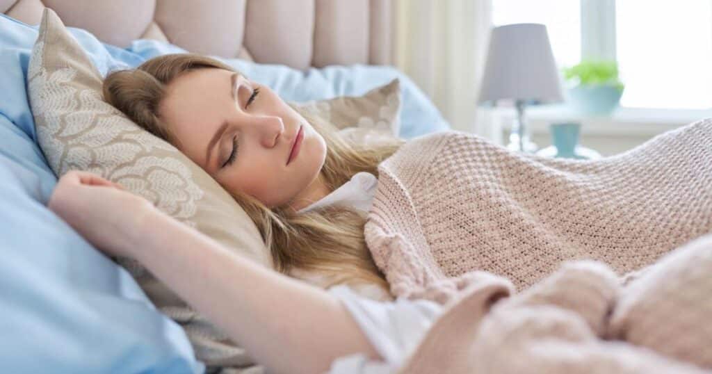 Woman going to bed without washing her face.