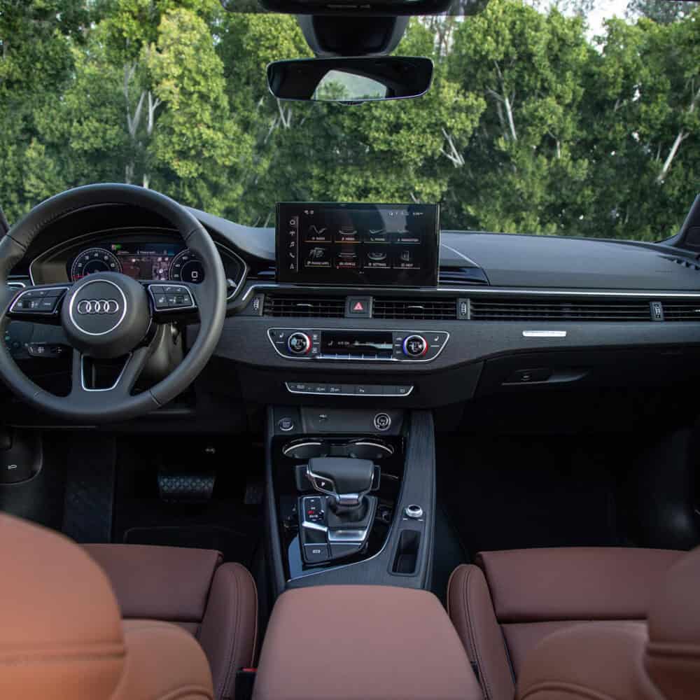 Interior kit for Audi A4, stylish dashboard and steering wheel upgrade.