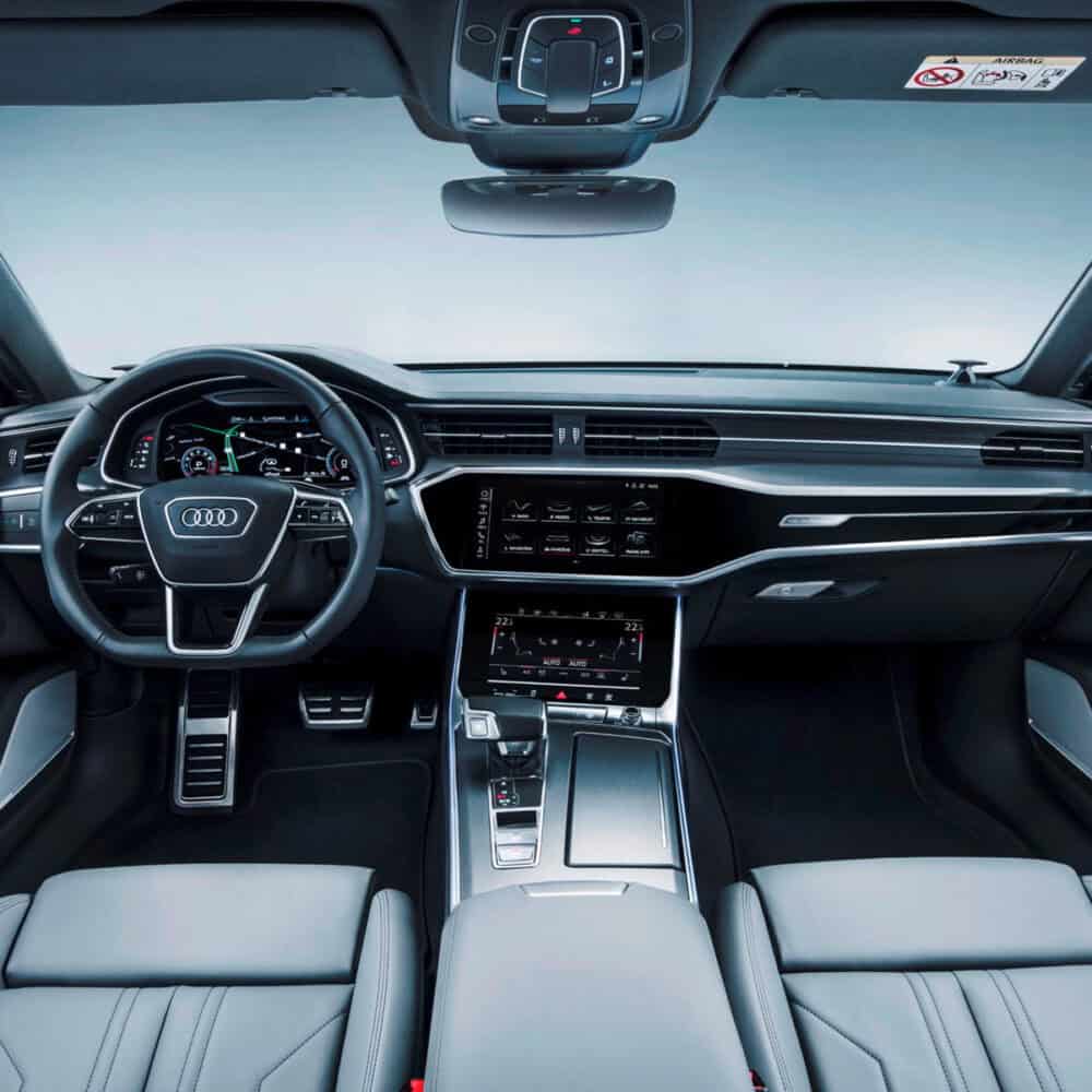 Interior dashboard and steering wheel of Audi A7 with custom interior kit.