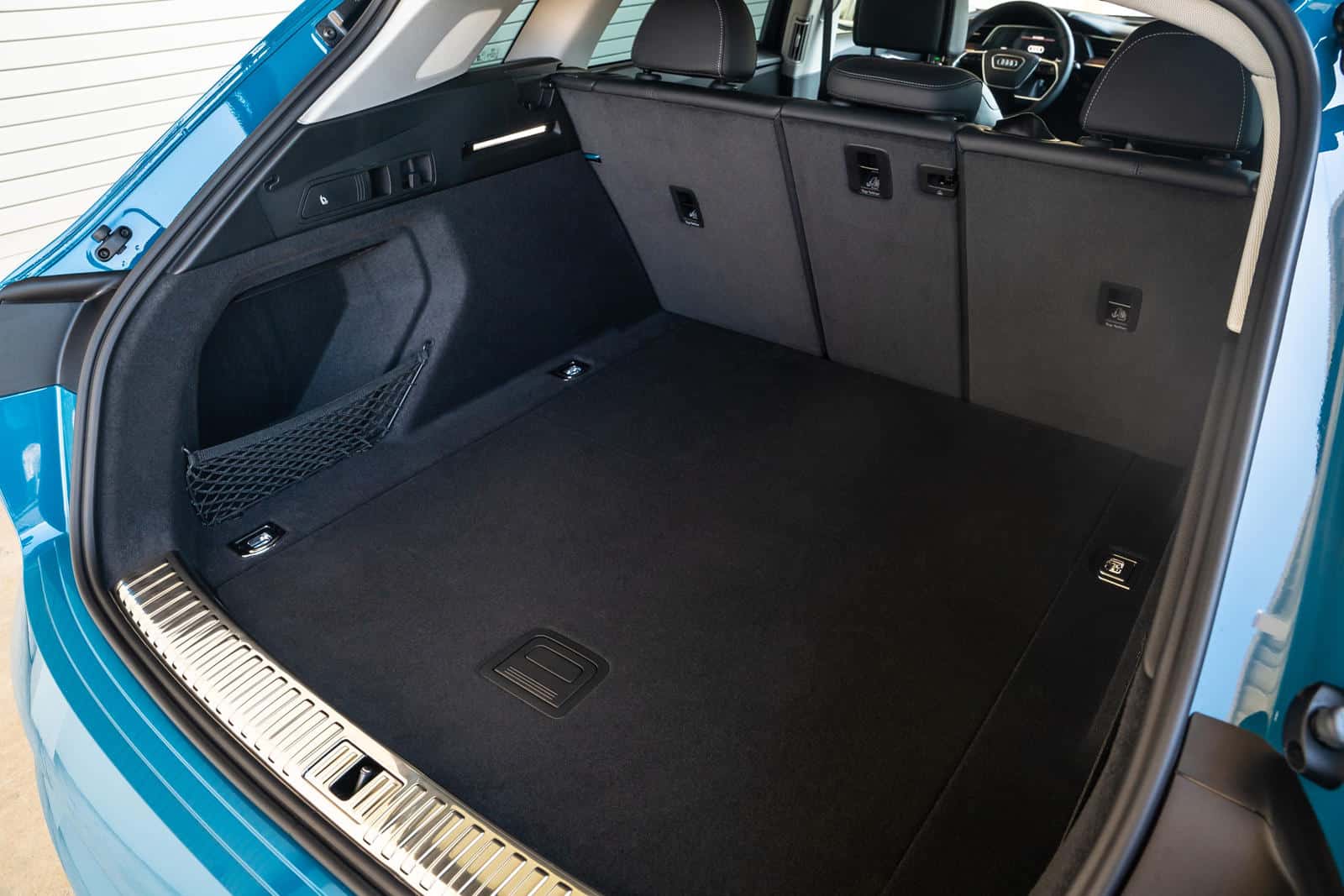 Audi e-tron cargo space organizer for enhanced storage.
