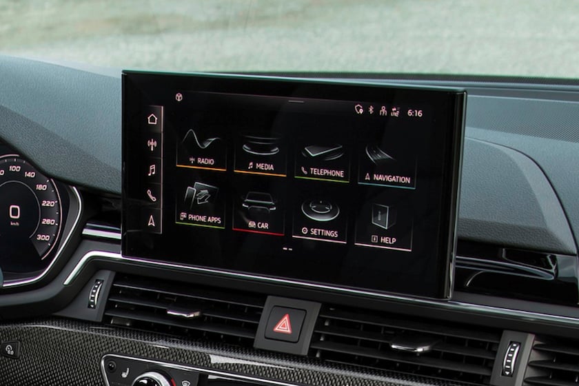 Car infotainment touchscreen display with various control icons.