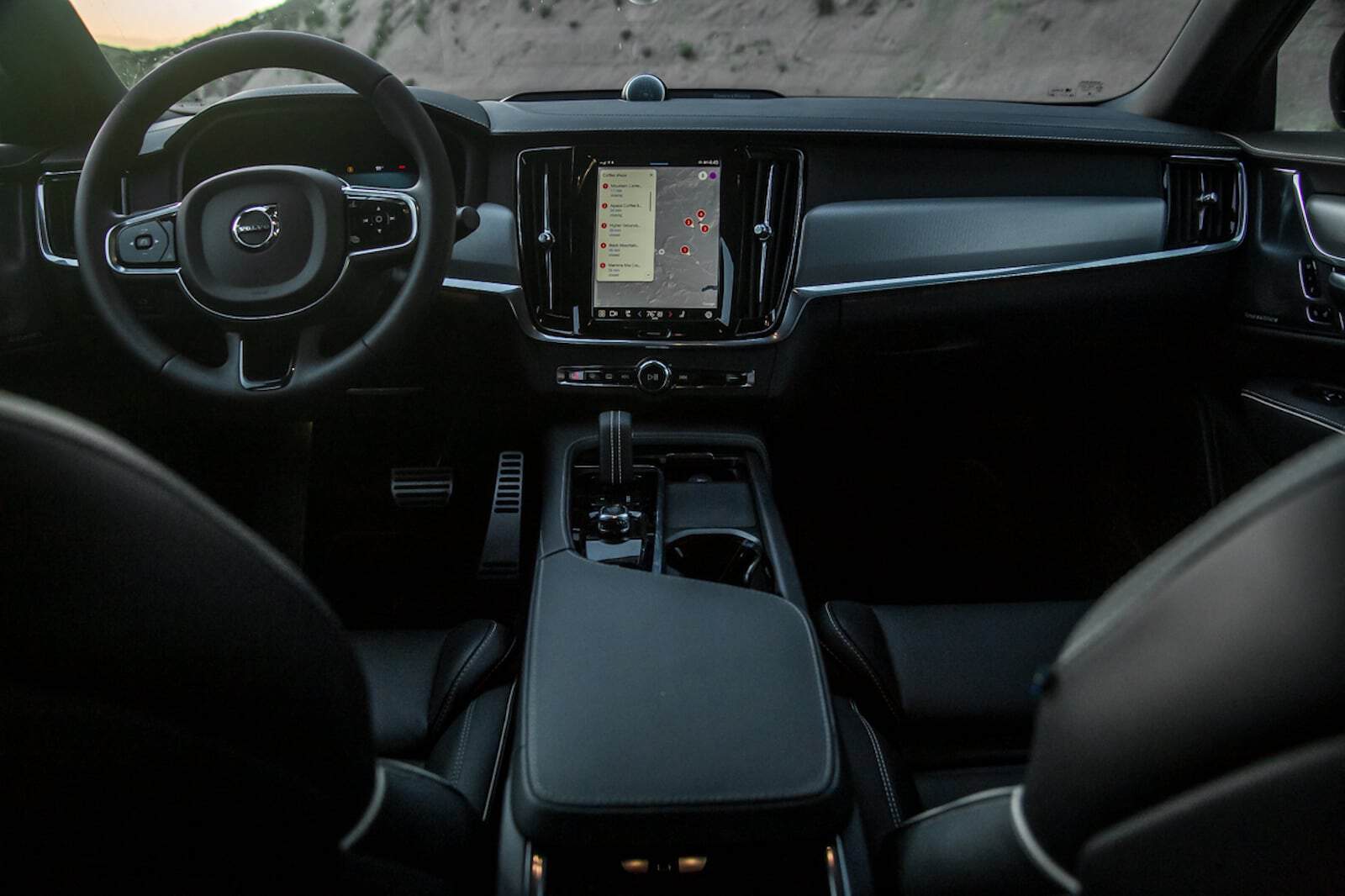 Interior car accessories for Volvo S90 dashboard and steering area.