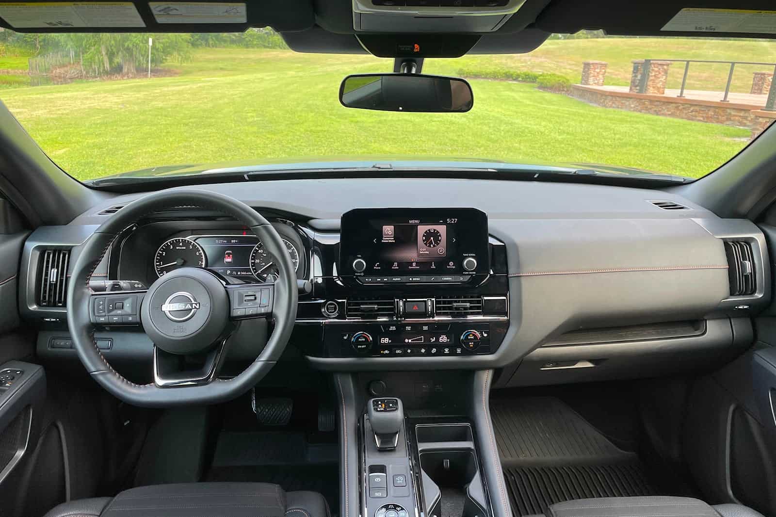 Interior dashboard and control panel of Nissan Pathfinder.