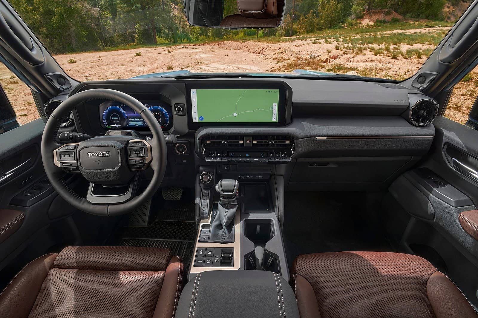 Interior upgrade for Toyota Land Cruiser with custom dashboard and tech features.