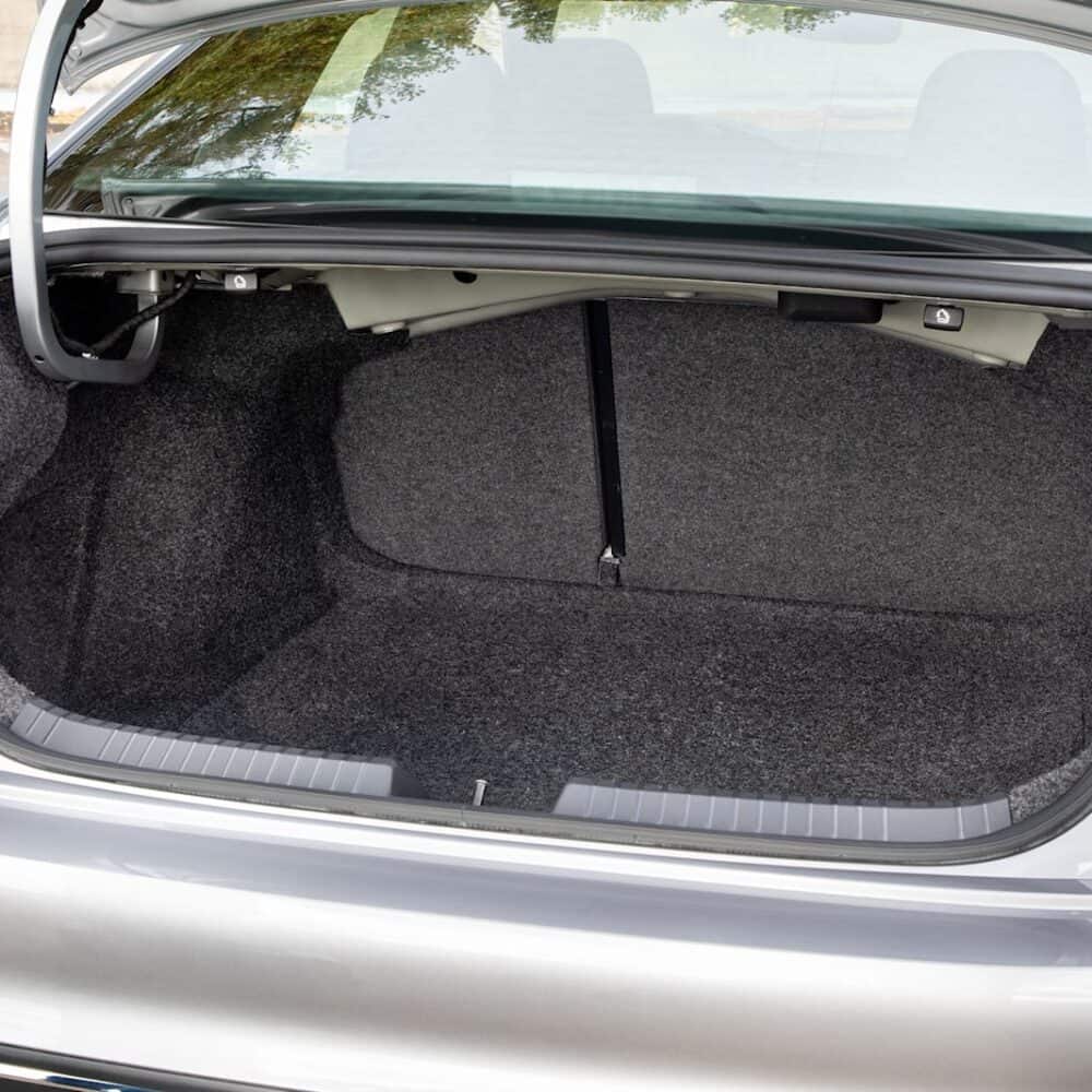 Volkswagen Jetta trunk organizer and protective mat for luggage area.