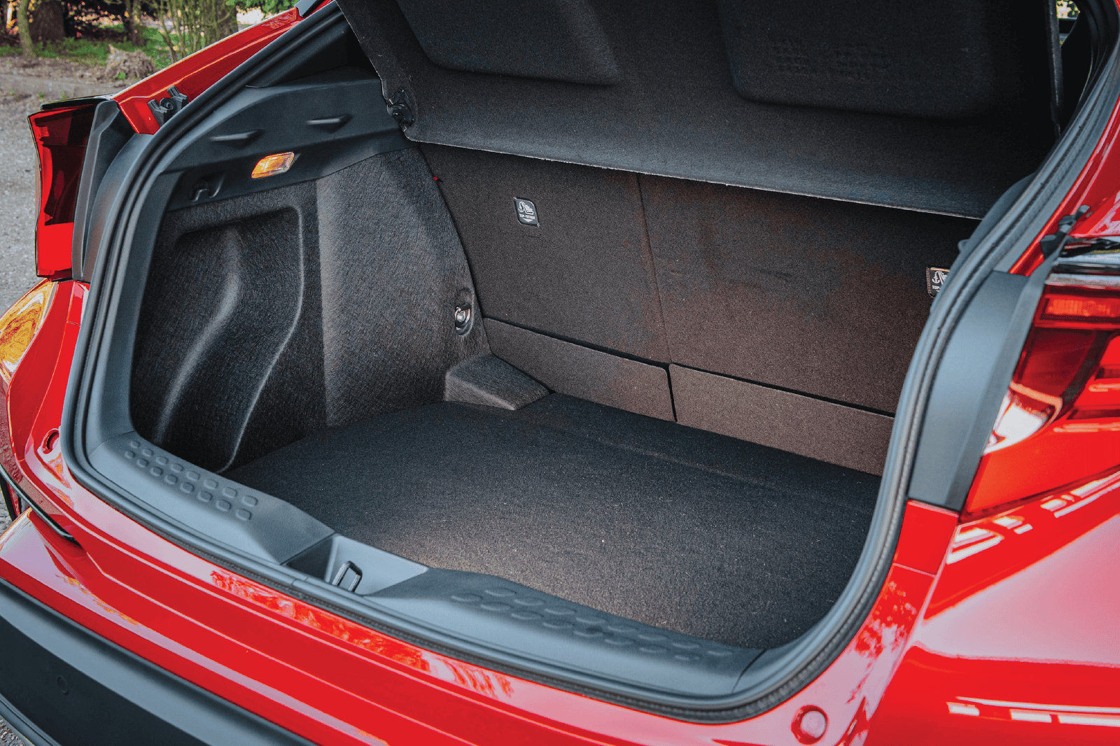 Toyota C-HR trunk cargo area kit for enhanced storage and organization.