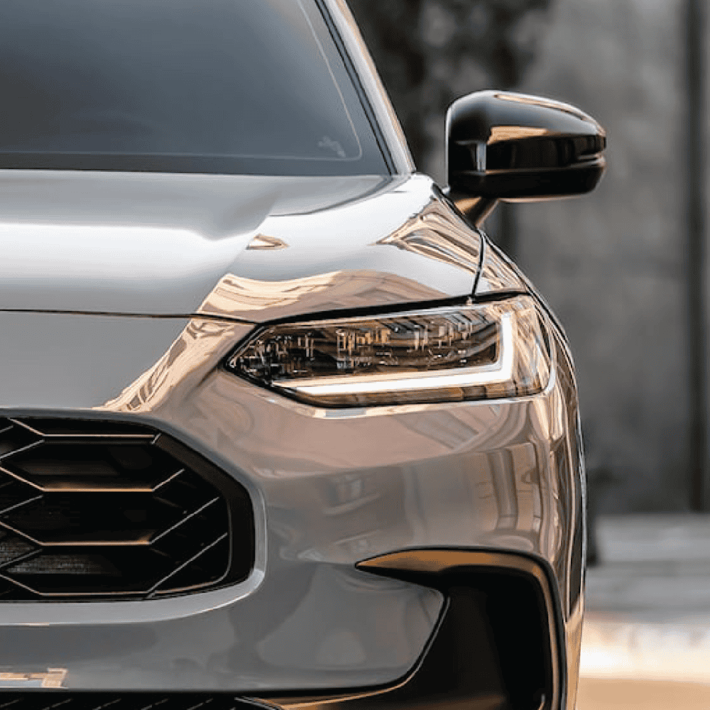 Close-up of Honda HR-V headlamp with LED lighting and sleek design.