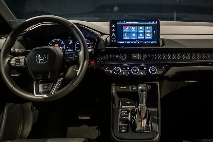 Interior upgrade kit for Honda CR-V with modern dashboard touchscreen and controls.
