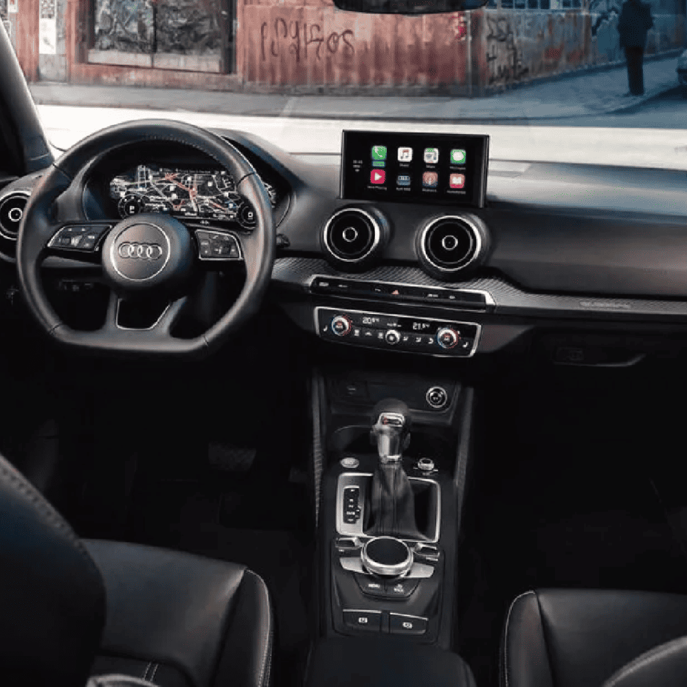 Enhanced Audi Q2L interior with premium accessories and trim. Perfect for a stylish and comfortable.