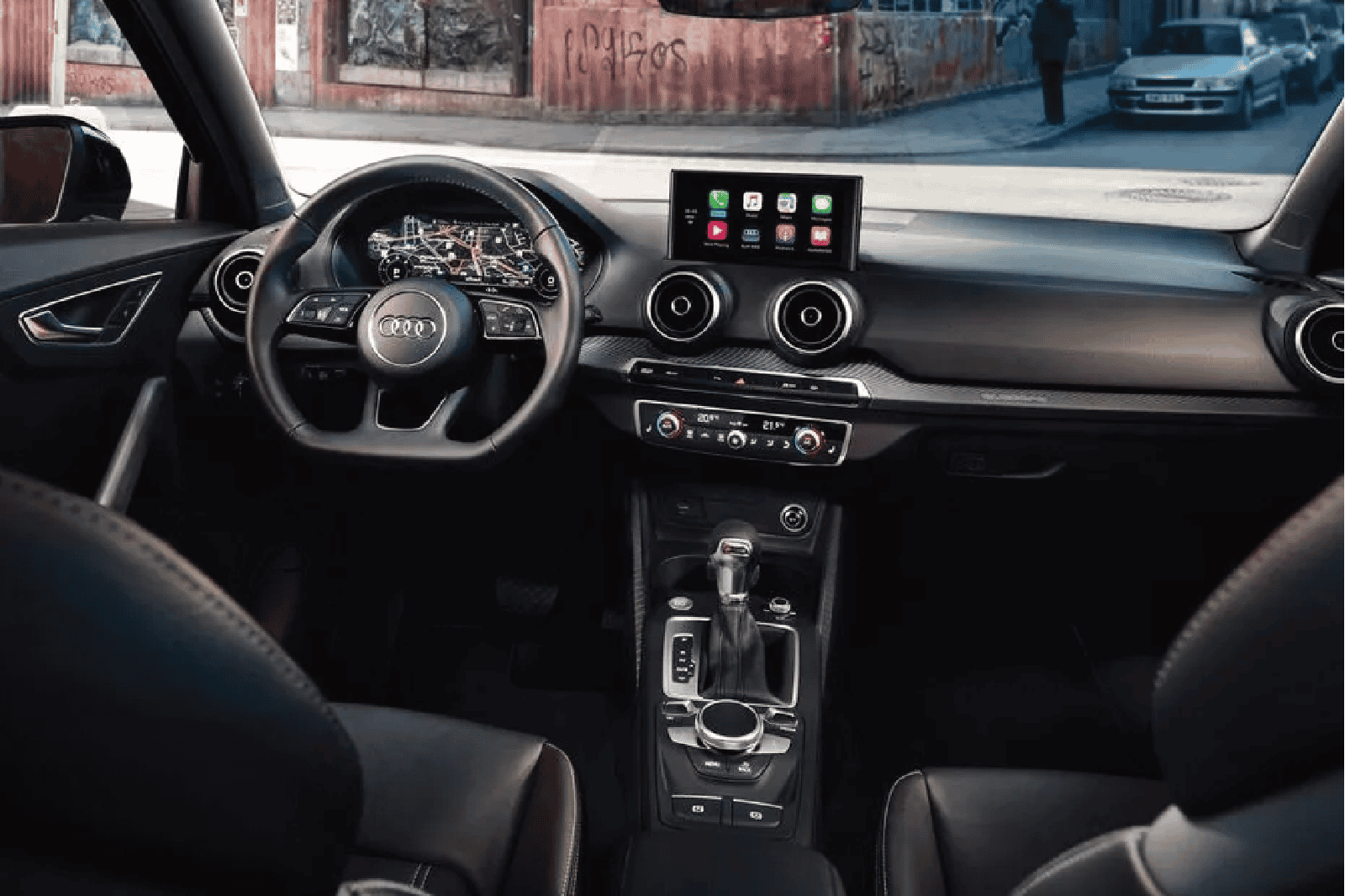 Enhanced Audi Q2L interior with premium accessories and trim. Perfect for a stylish and comfortable.