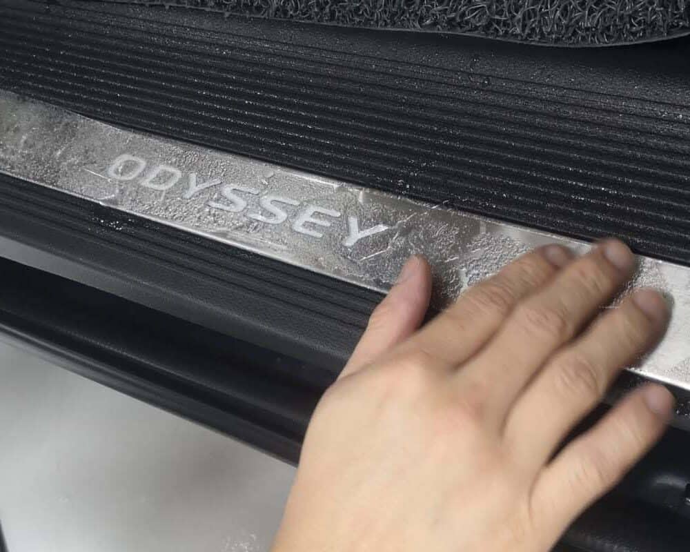 Rikecool team installing Xpel Ultimate Plus Paint Protection Film PPF on Honda Odyssey side steps