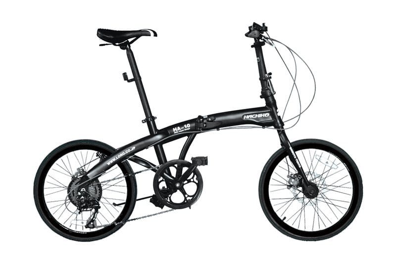 Folding bike with protective film on the frame for durability and style. Perfect for city commuting.