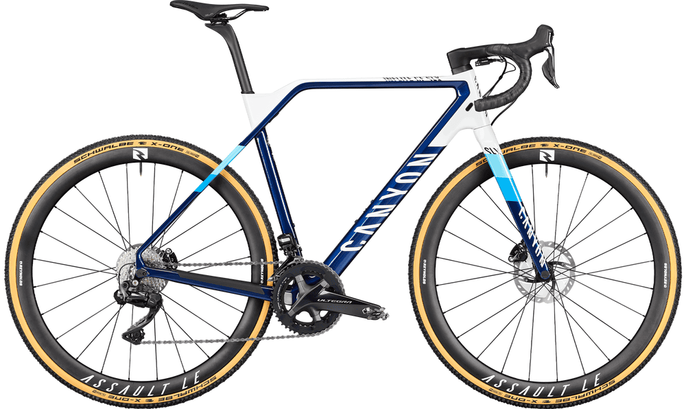 High-performance blue and white road bike with carbon frame and aerodynamic design.