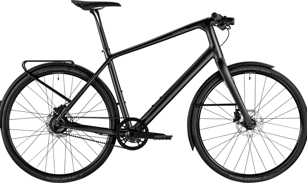 A black modern city bike with lightweight frame and durable tires for comfortable riding.