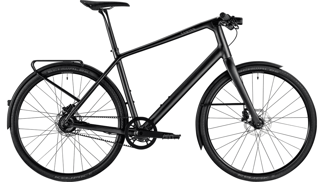 A black modern city bike with lightweight frame and durable tires for comfortable riding.