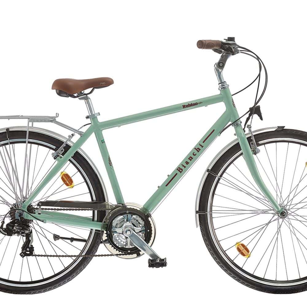 Light green bicycle with brown saddle and black tires, ideal for city commuting and outdoor cycling.