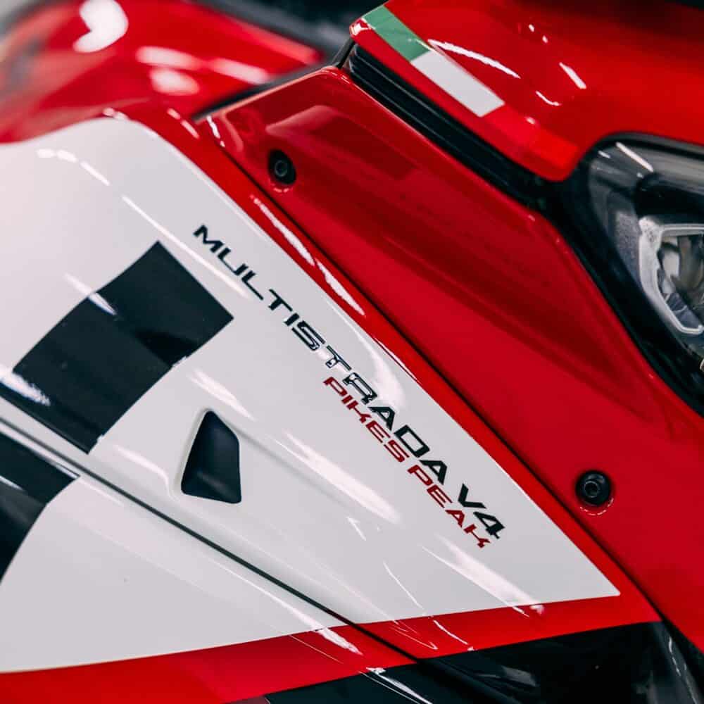 Close-up of a motorcycle with detailed polishing and PPF installation.