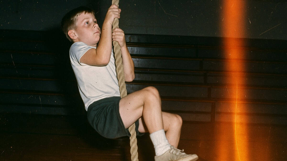 School Punishments That Were Legal Then But Would Be Criminal Now 17 Image of a vintage gym class showcasing rigorous physical education activities.