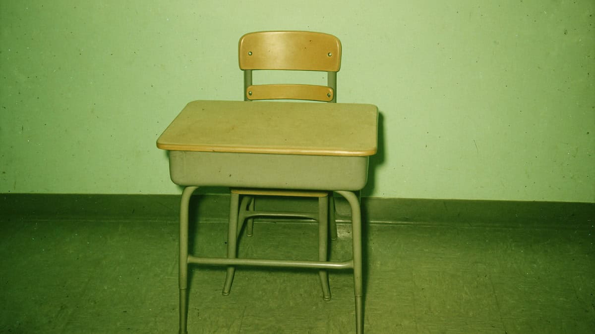 School Punishments That Were Legal Then But Would Be Criminal Now 16 Image of a classroom with a student facing the wall as punishment.