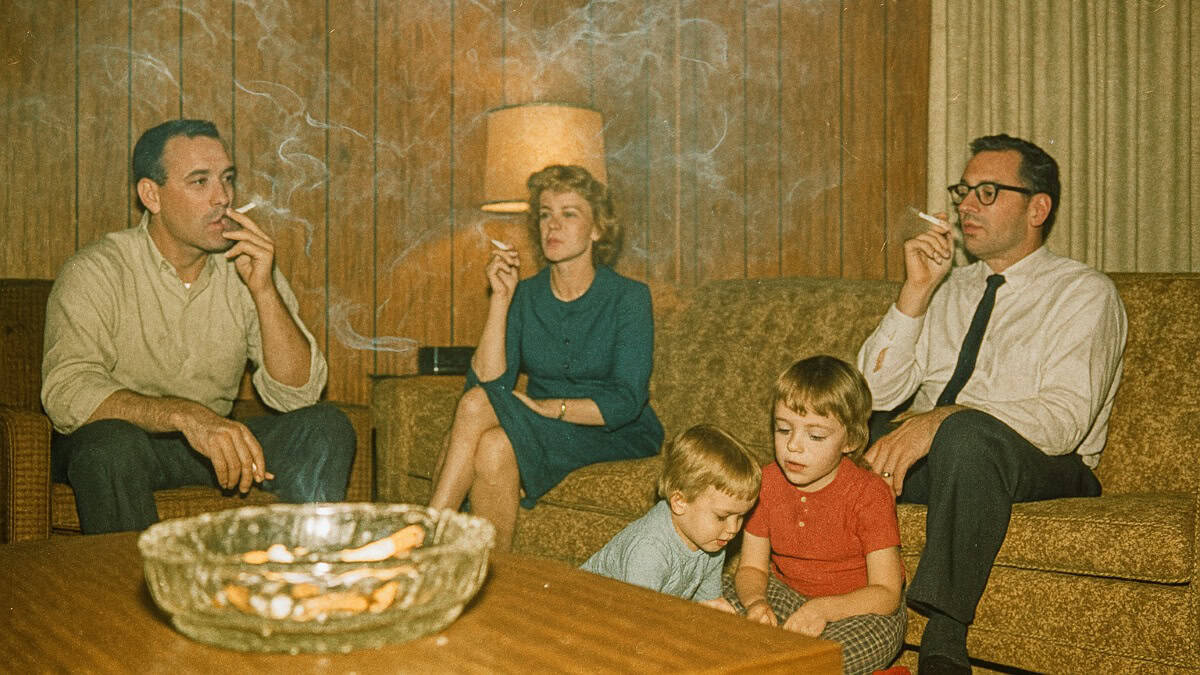 Image depicting kids playing in a smoky environment, reflecting past norms.
