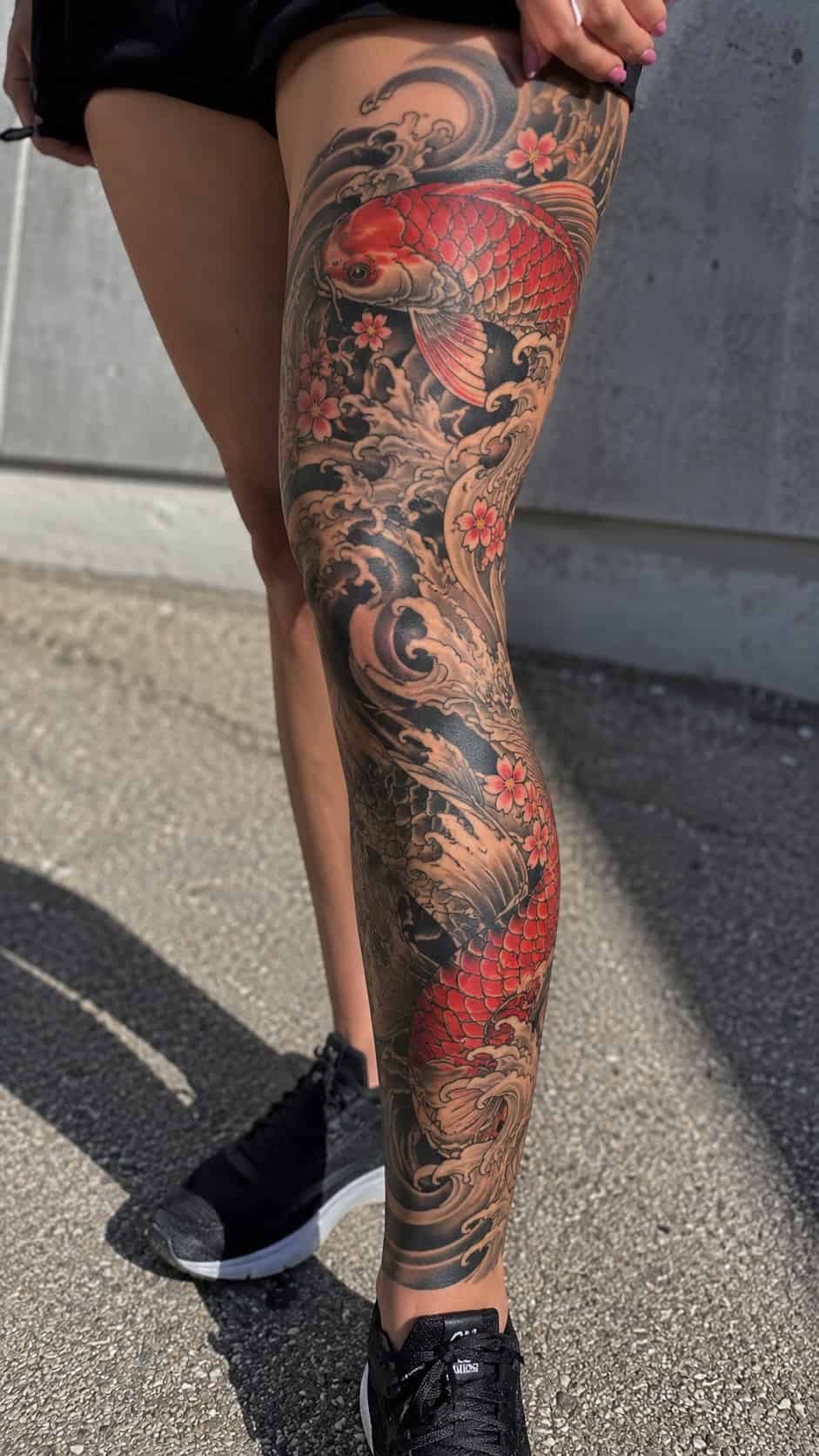 32 Gorgeous Female Leg Sleeve Tattoos 48 Japanese Koi and Waves