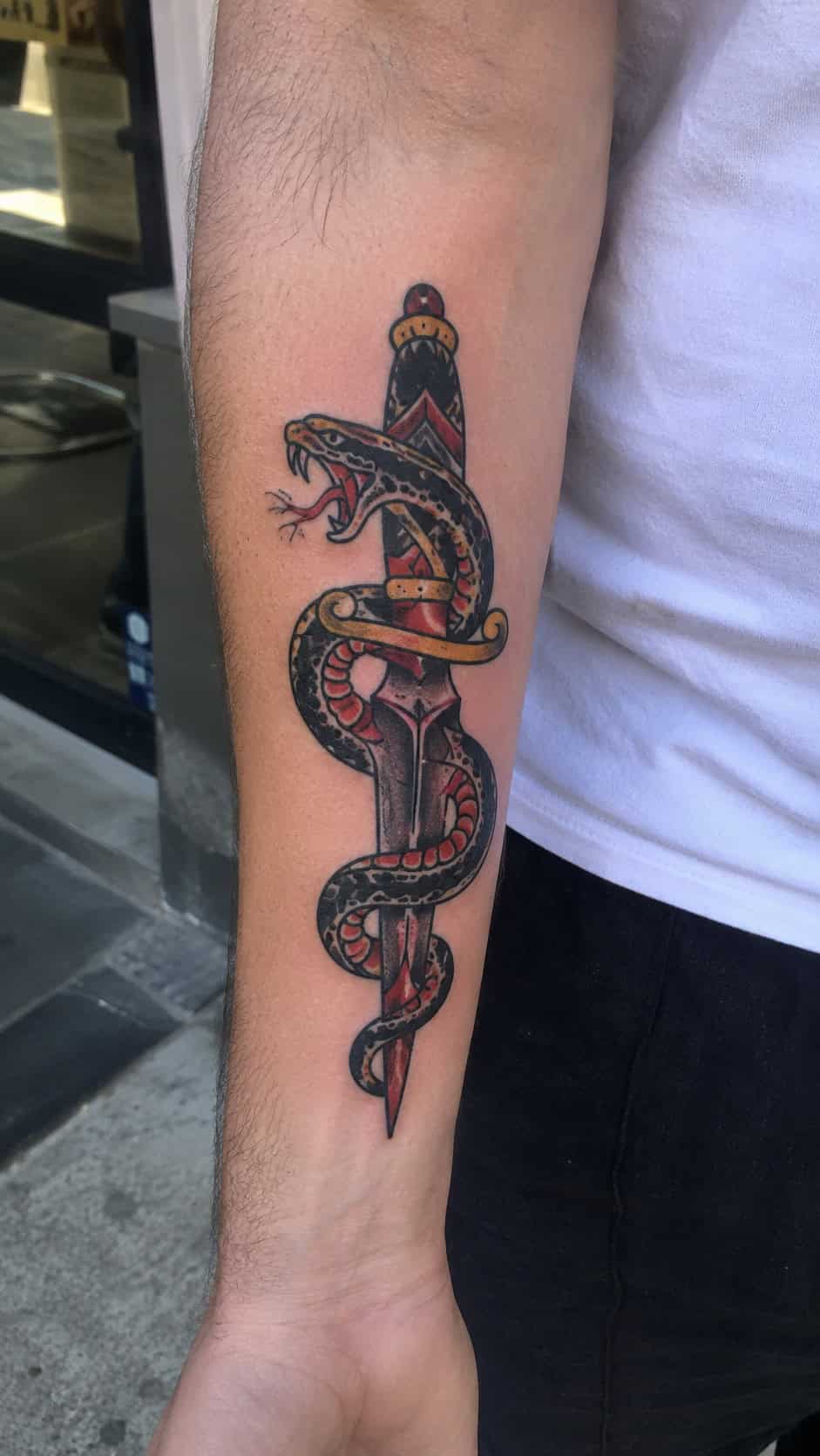 48 Tattoo Ideas for Men Worth Considering for Your Next Ink 81 Snake and Dagger