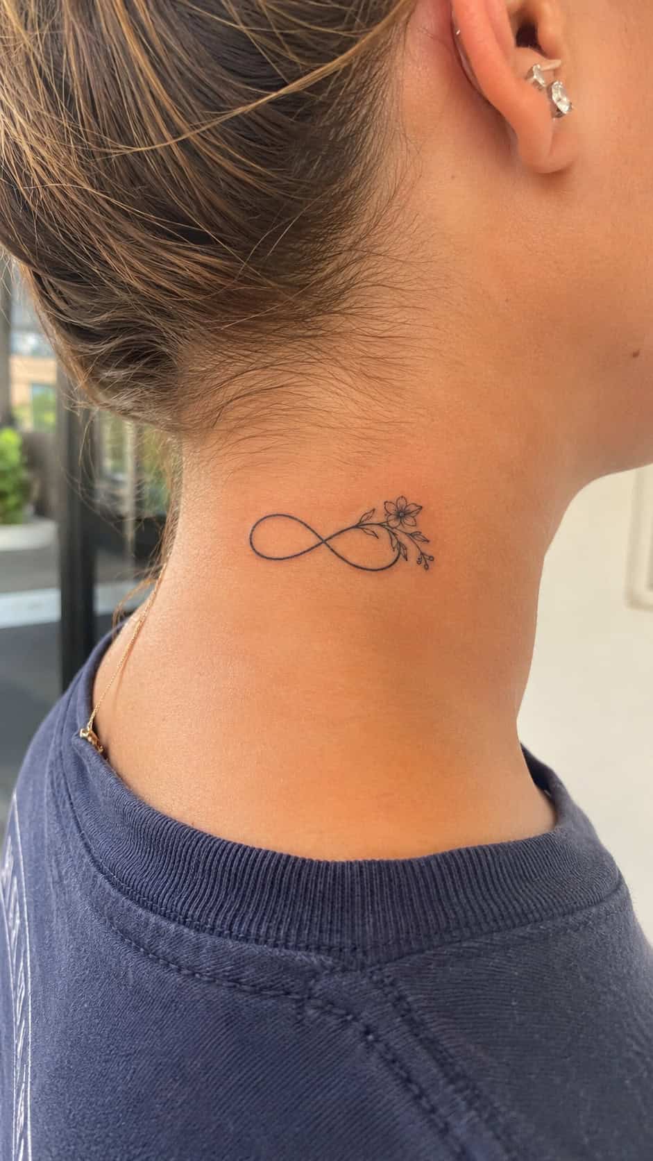 Infinity Symbol with Floral Accent