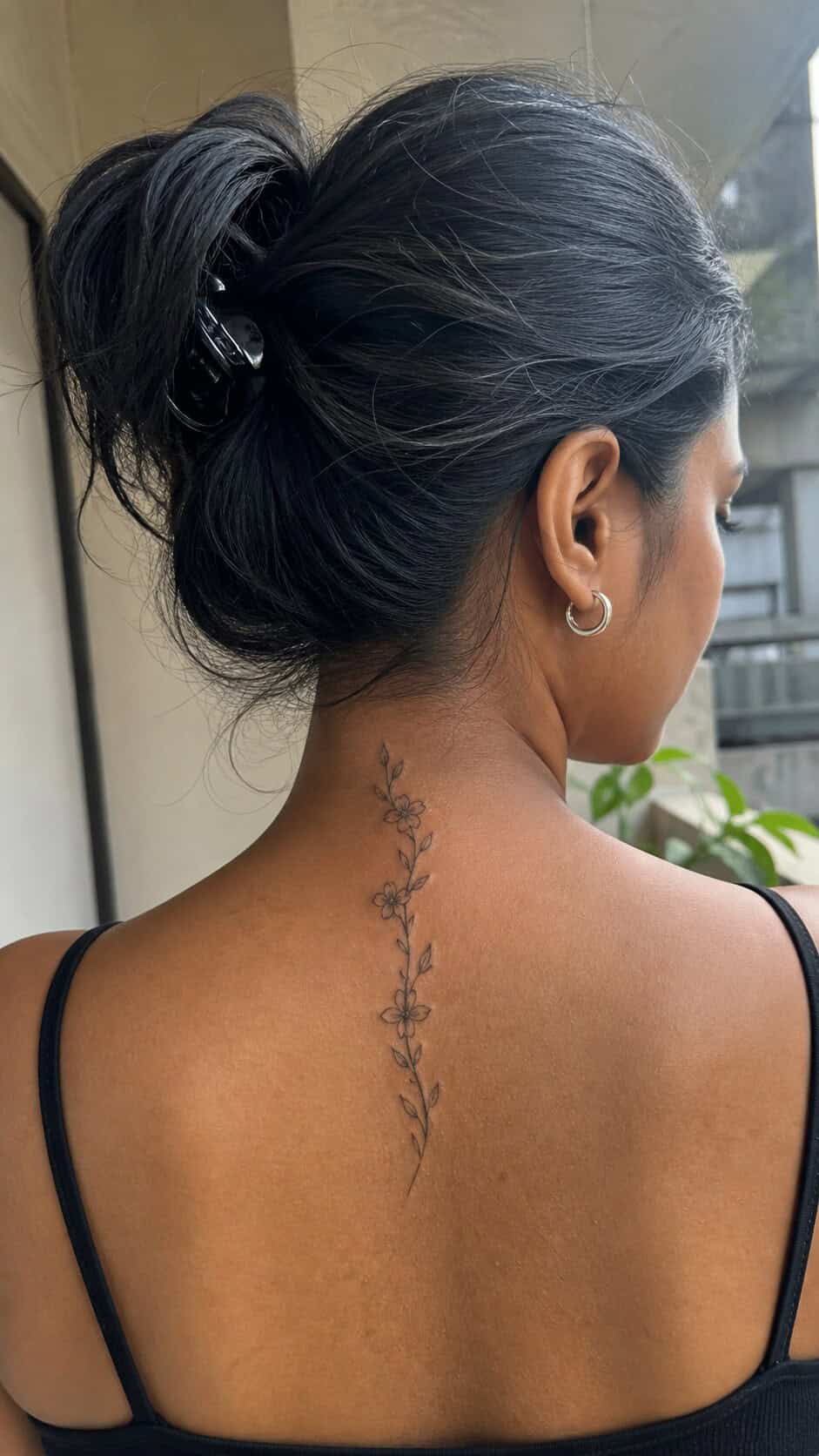 From Delicate to Daring: 28 Neck Tattoo Ideas for Every Woman 3 Ethereal Floral Vine neck tattoo idea, example 2