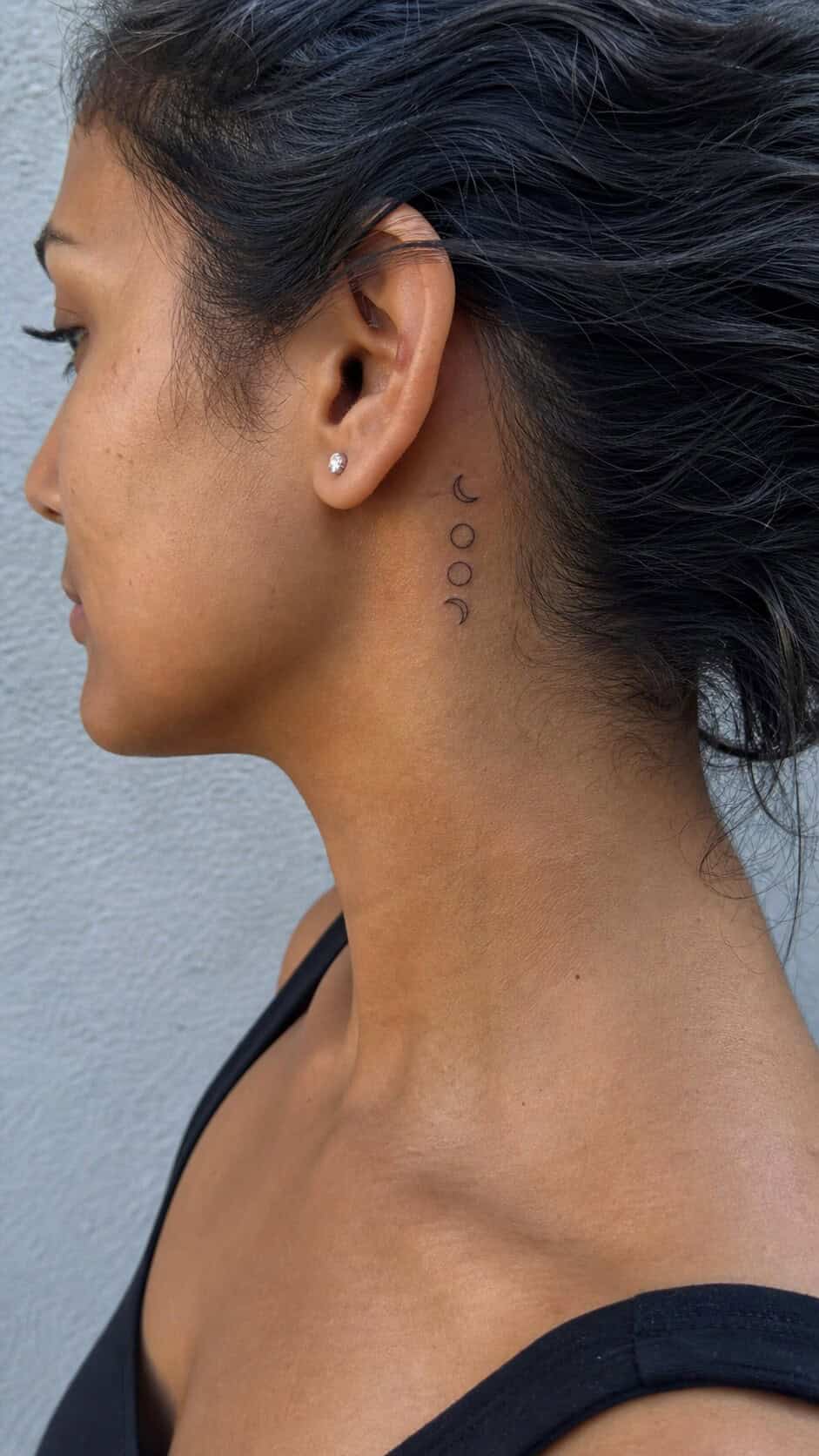 From Delicate to Daring: 28 Neck Tattoo Ideas for Every Woman 6 Minimalist Moon Phases neck tattoo idea, example 2