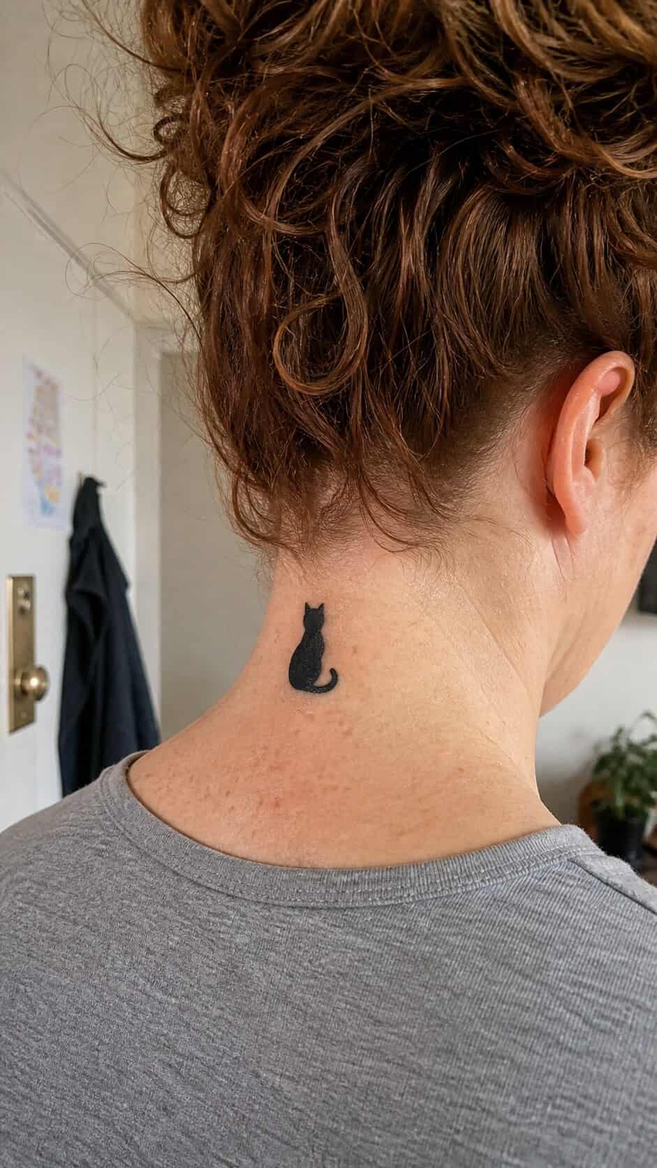 From Delicate to Daring: 28 Neck Tattoo Ideas for Every Woman 16 Feline Silhouette neck tattoo idea