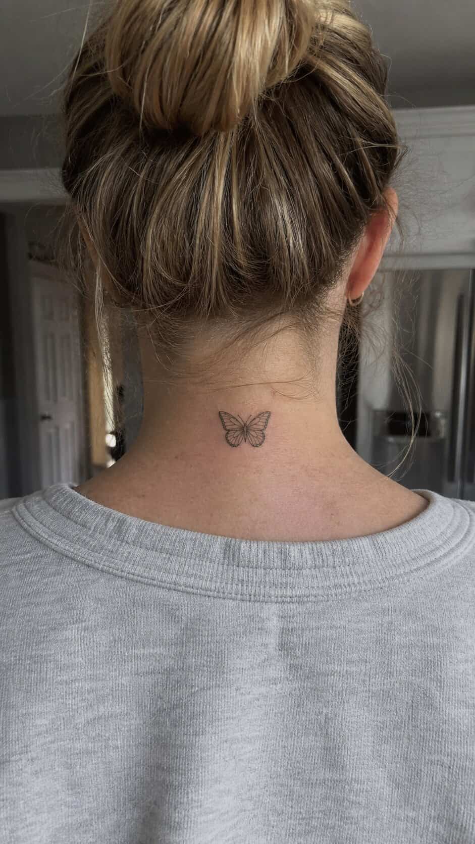 From Delicate to Daring: 28 Neck Tattoo Ideas for Every Woman 21 Delicate Butterfly neck tattoo idea