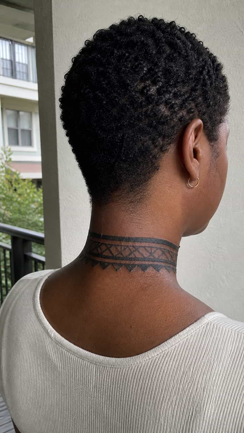 From Delicate to Daring: 28 Neck Tattoo Ideas for Every Woman 25 Tribal Neck Band neck tattoo idea, example 3