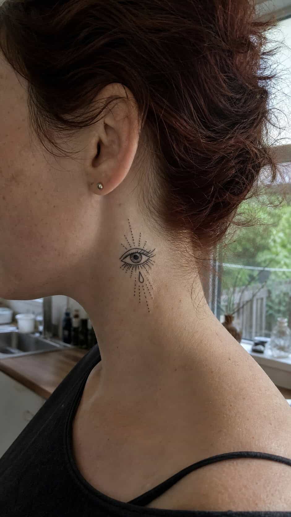 From Delicate to Daring: 28 Neck Tattoo Ideas for Every Woman 26 Mystical Eye neck tattoo idea