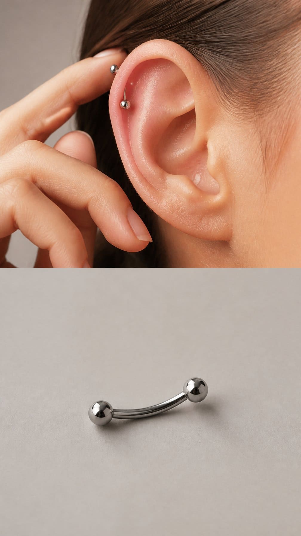 Close-up of a curved barbell piercing positioned through the upper ear.