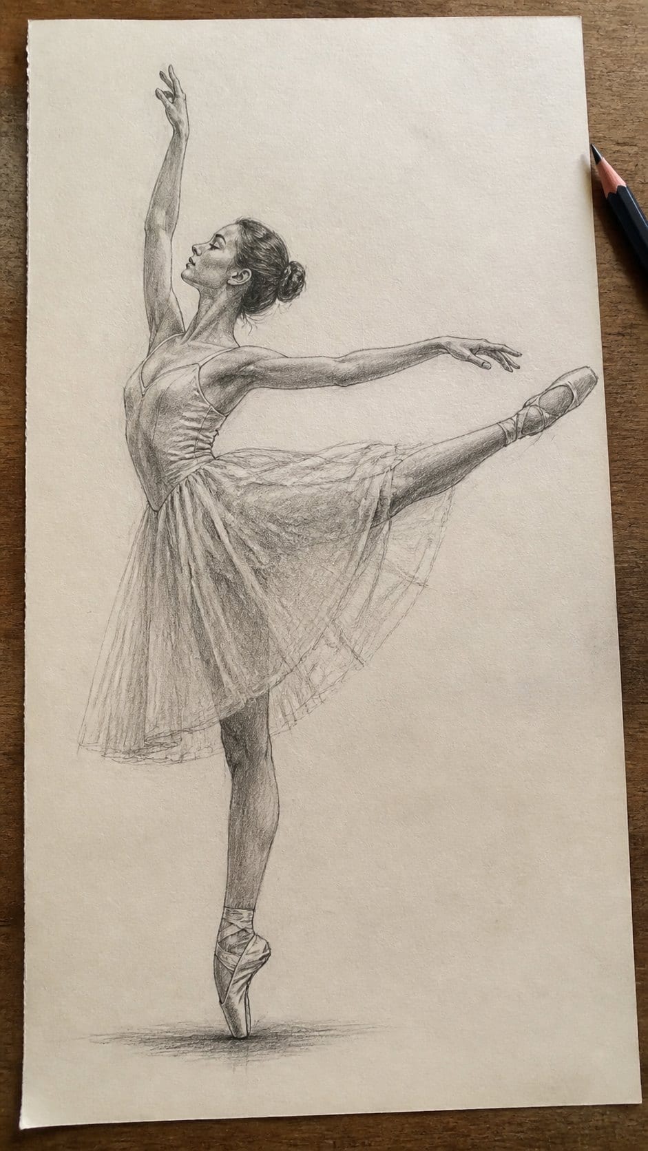 20 Girl Drawing Concepts to Elevate Your Art Game 9 Hand-drawn classic ballet dancer in graphite drawing on textured paper, shown in a straight overhead view — study 2