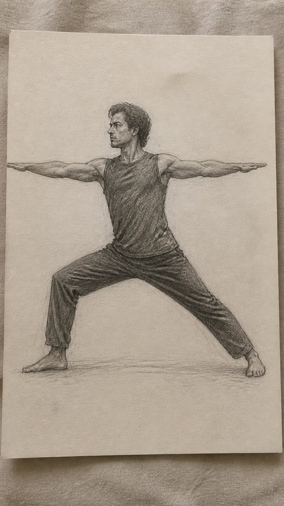 Hand-drawn powerful warrior pose in graphite drawing on textured paper, shown in a slightly off-center overhead composition, like an — study 2