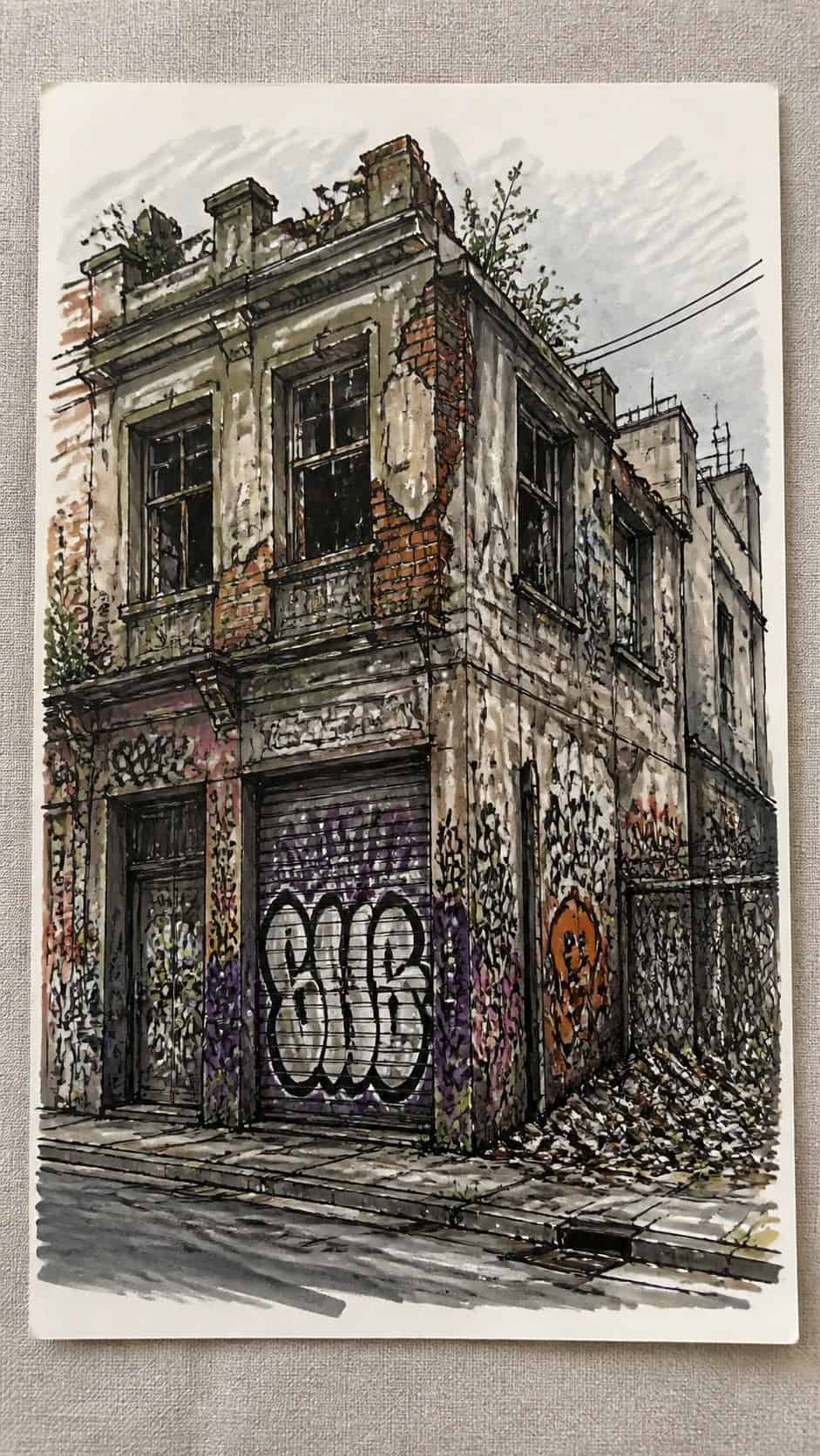 30 Grunge Drawing Ideas for Real Depth and Texture 4 Hand-drawn urban decay in marker drawing on textured paper, shown in a straight overhead view — study 1