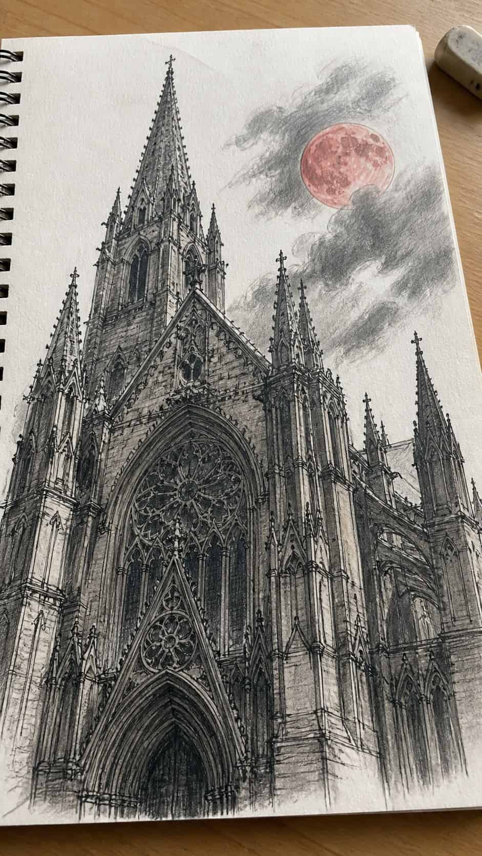 30 Grunge Drawing Ideas for Real Depth and Texture 16 Hand-drawn gothic architecture in mixed-media hand drawing on textured paper, shown in a gentle oblique desk view that shows paper — study 1