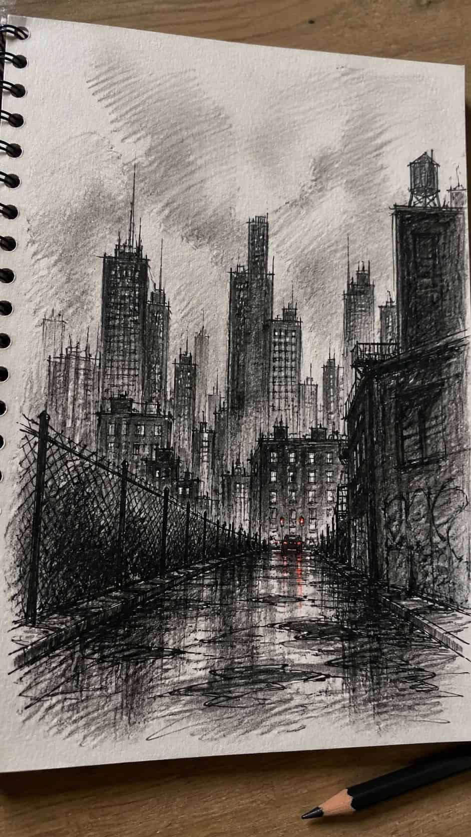 30 Grunge Drawing Ideas for Real Depth and Texture 29 Hand-drawn grunge cityscape in mixed-media hand drawing on textured paper, shown in a gentle oblique desk view that shows paper tooth — study 1