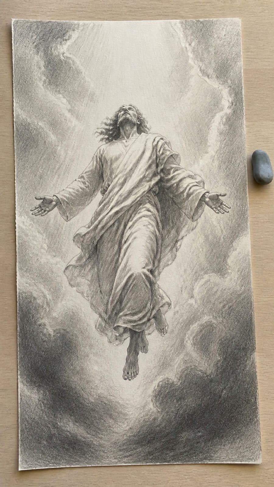 Hand-drawn the ascension in graphite drawing on textured paper, shown in a close overhead crop — study 3