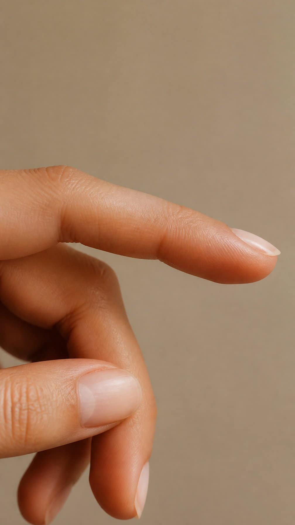 Close-up of a hand showing the side of a finger with blank skin.