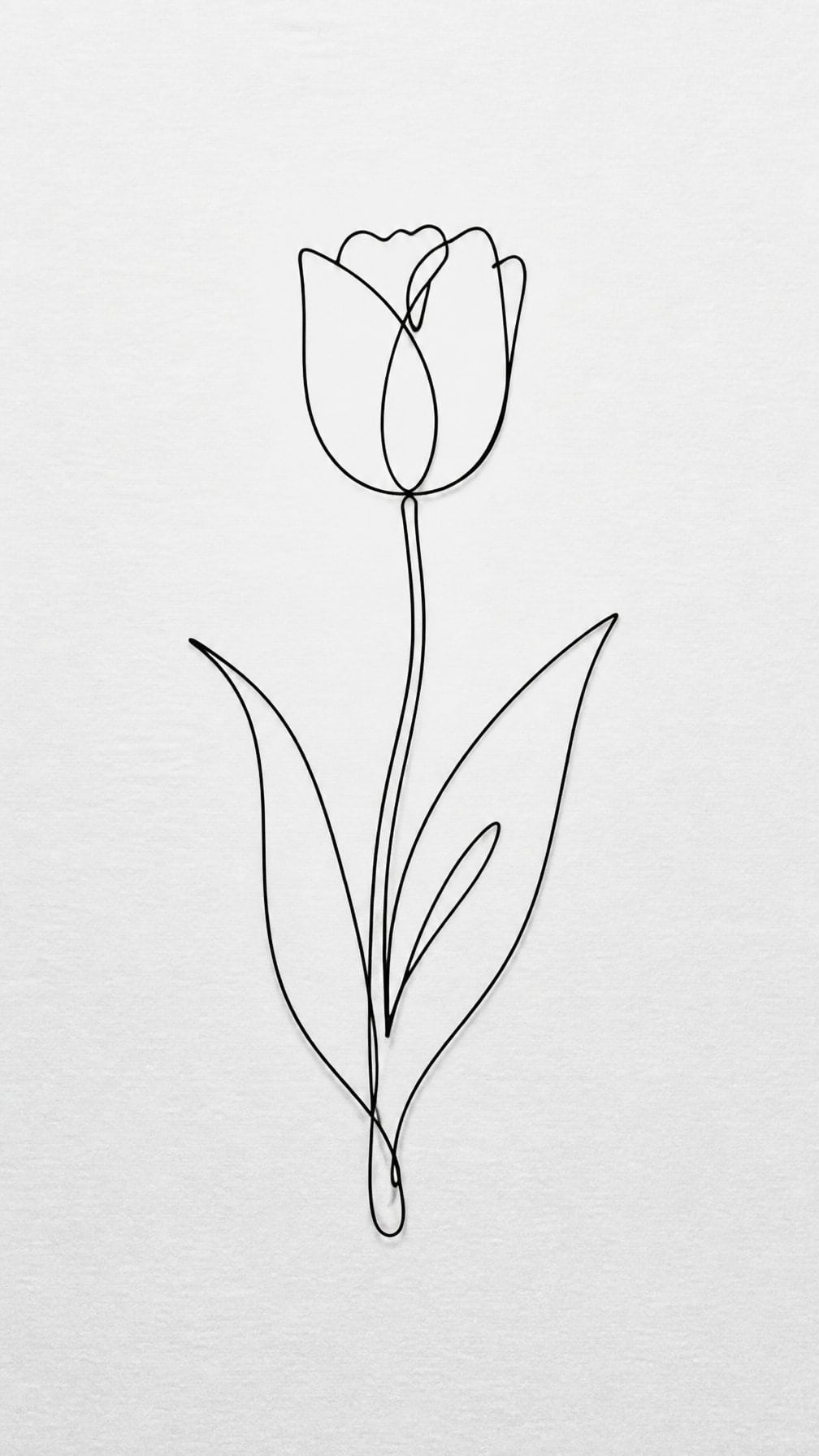A simple black single-line drawing of a tulip with a stem and two leaves on white paper.